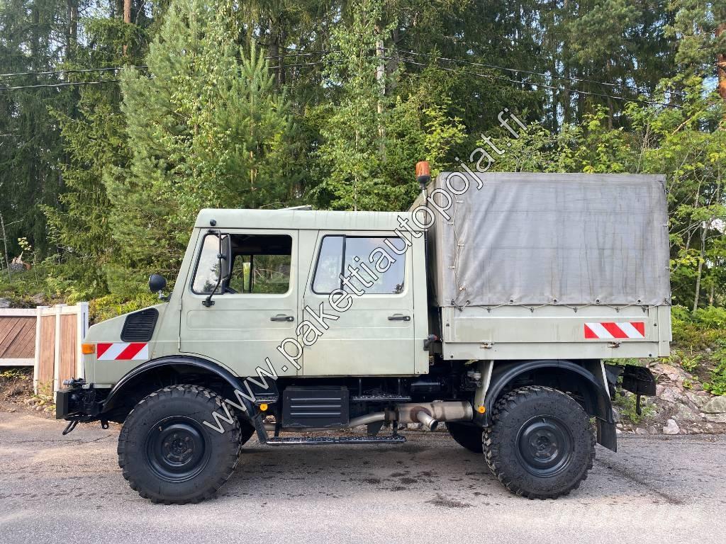 Unimog U 1250L DoKa Curtain sider trucks