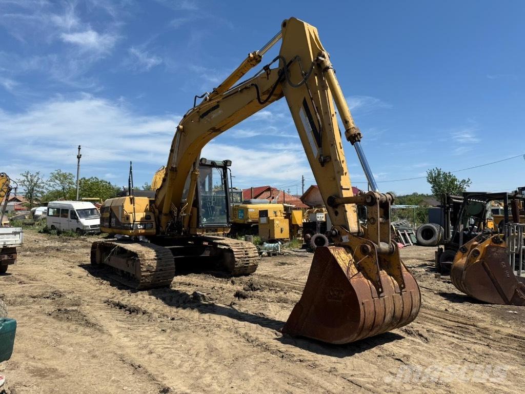 CAT 318 Tracks, chains and undercarriage
