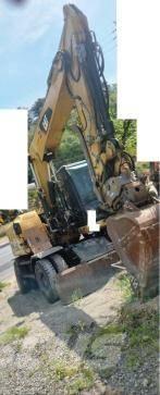 CAT M 313 D Wheeled excavators