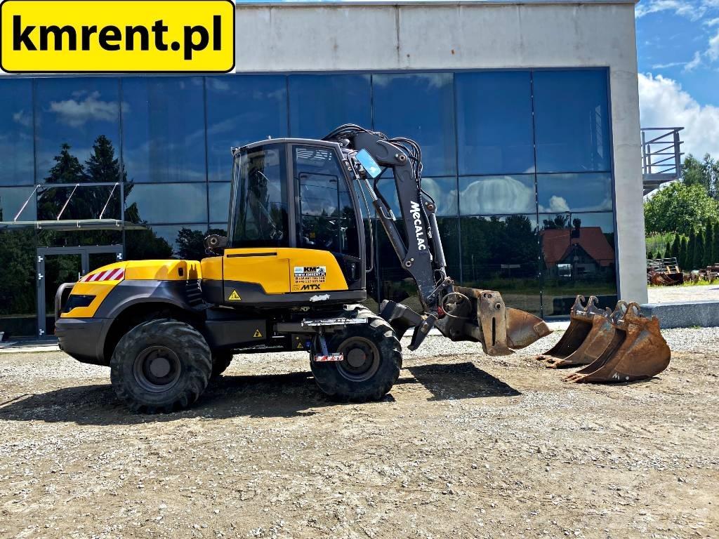 Mecalac 12 M TX Backhoe