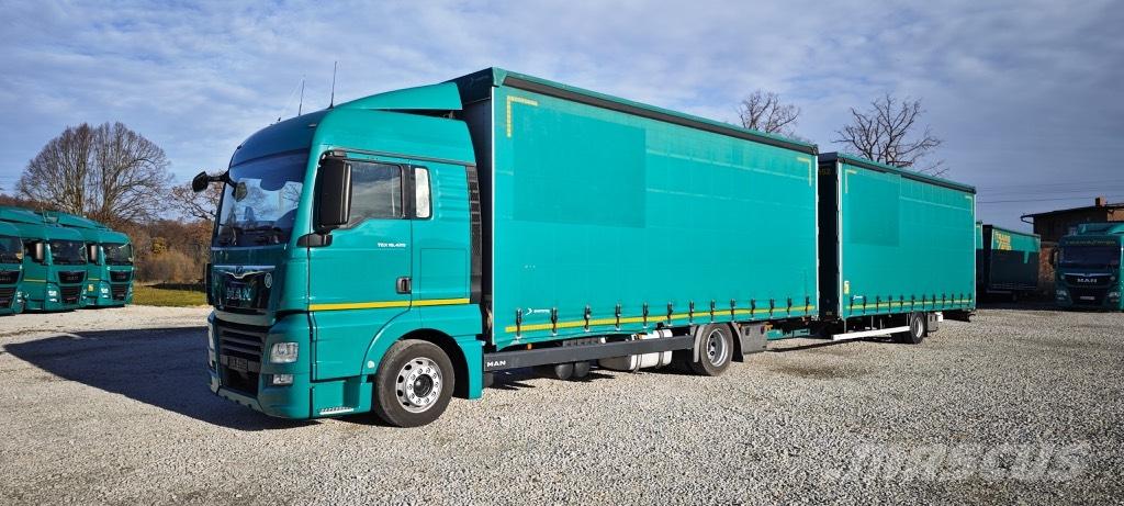 MAN TGX 18.420 Curtain sider trucks