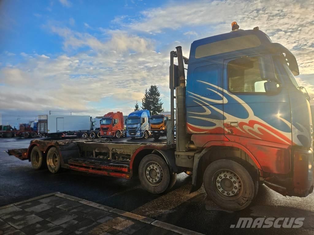 Volvo FH12 8x4 Forest machine transport trucks