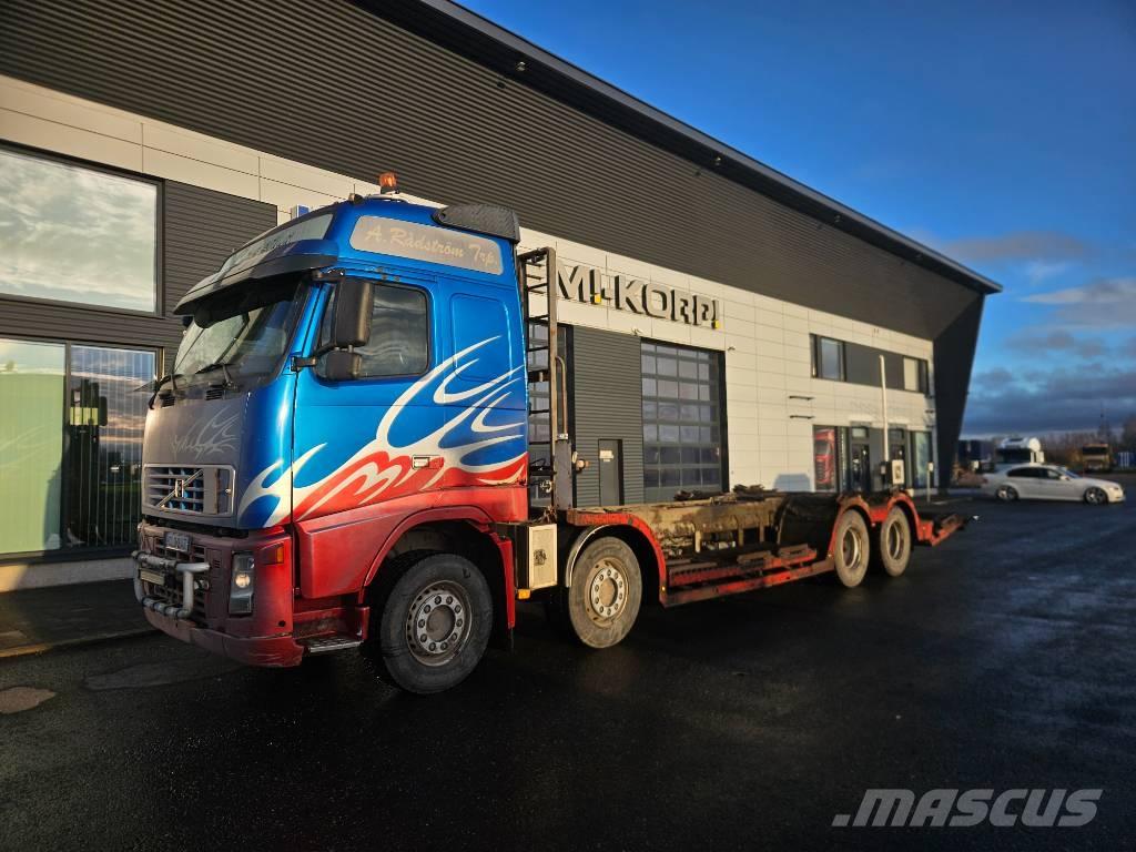 Volvo FH12 8x4 Forest machine transport trucks