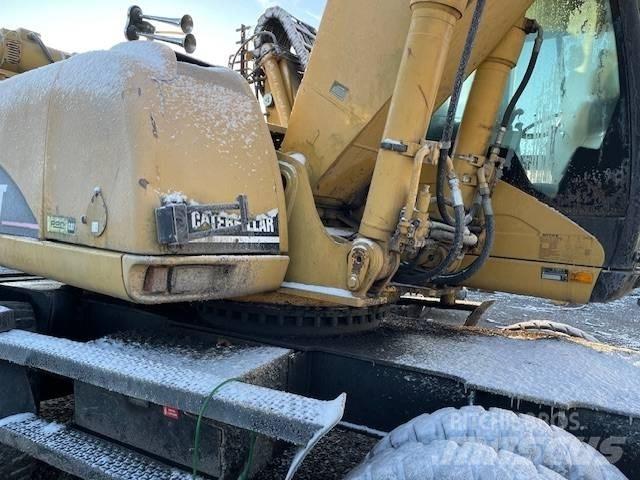 CAT M 322 C MH Wheeled excavators