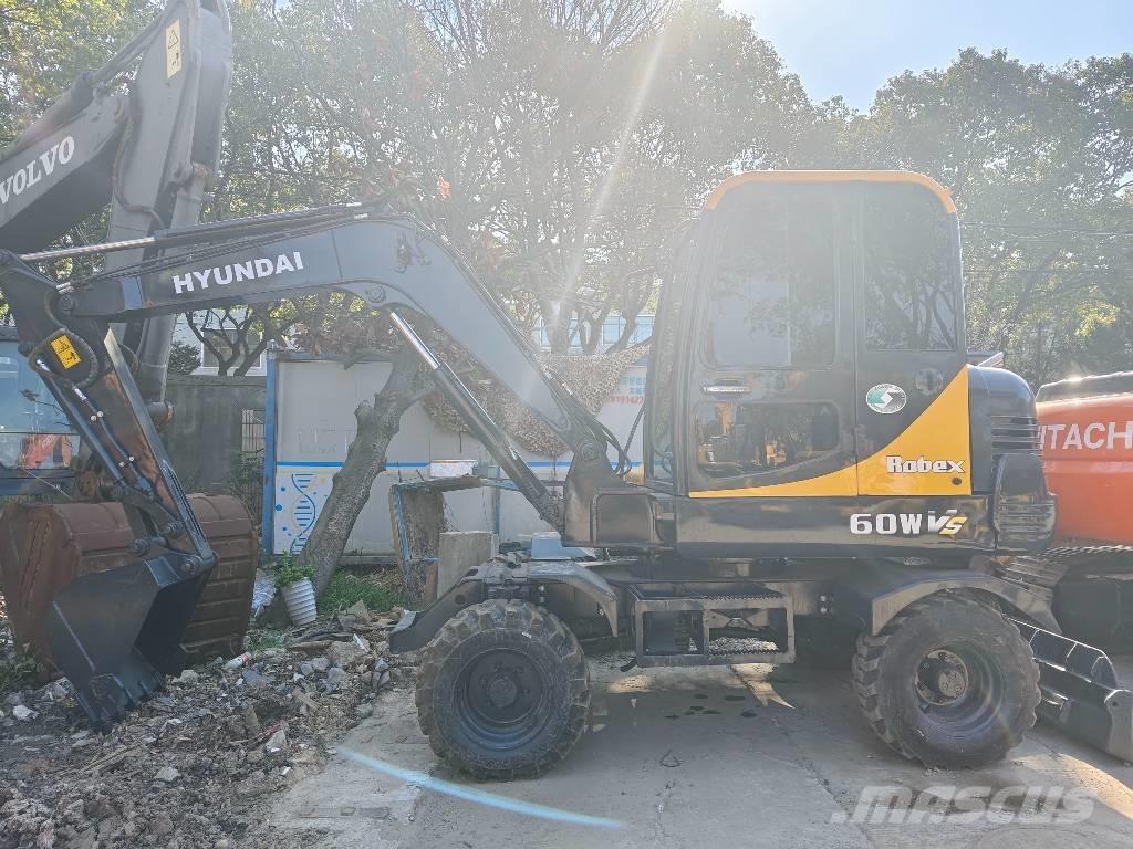 Hyundai 60 W VS Mini excavators < 7t (Mini diggers)