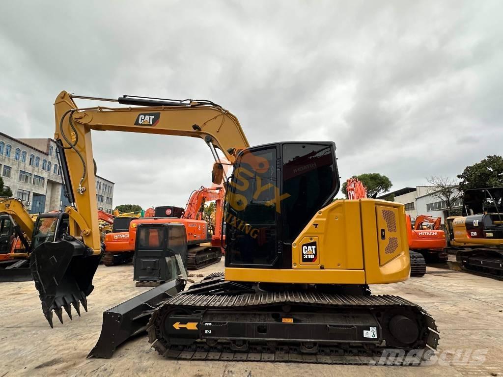 CAT 310 Mini excavators < 7t (Mini diggers)
