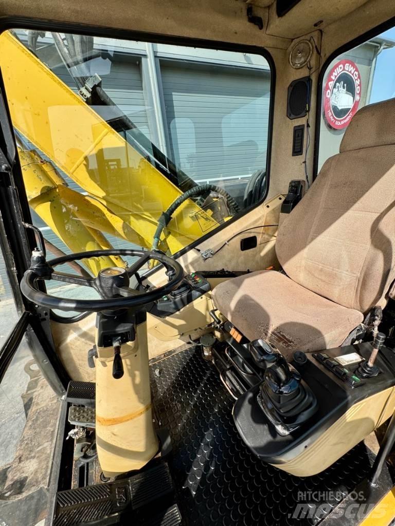 CAT M 312 Wheeled excavators