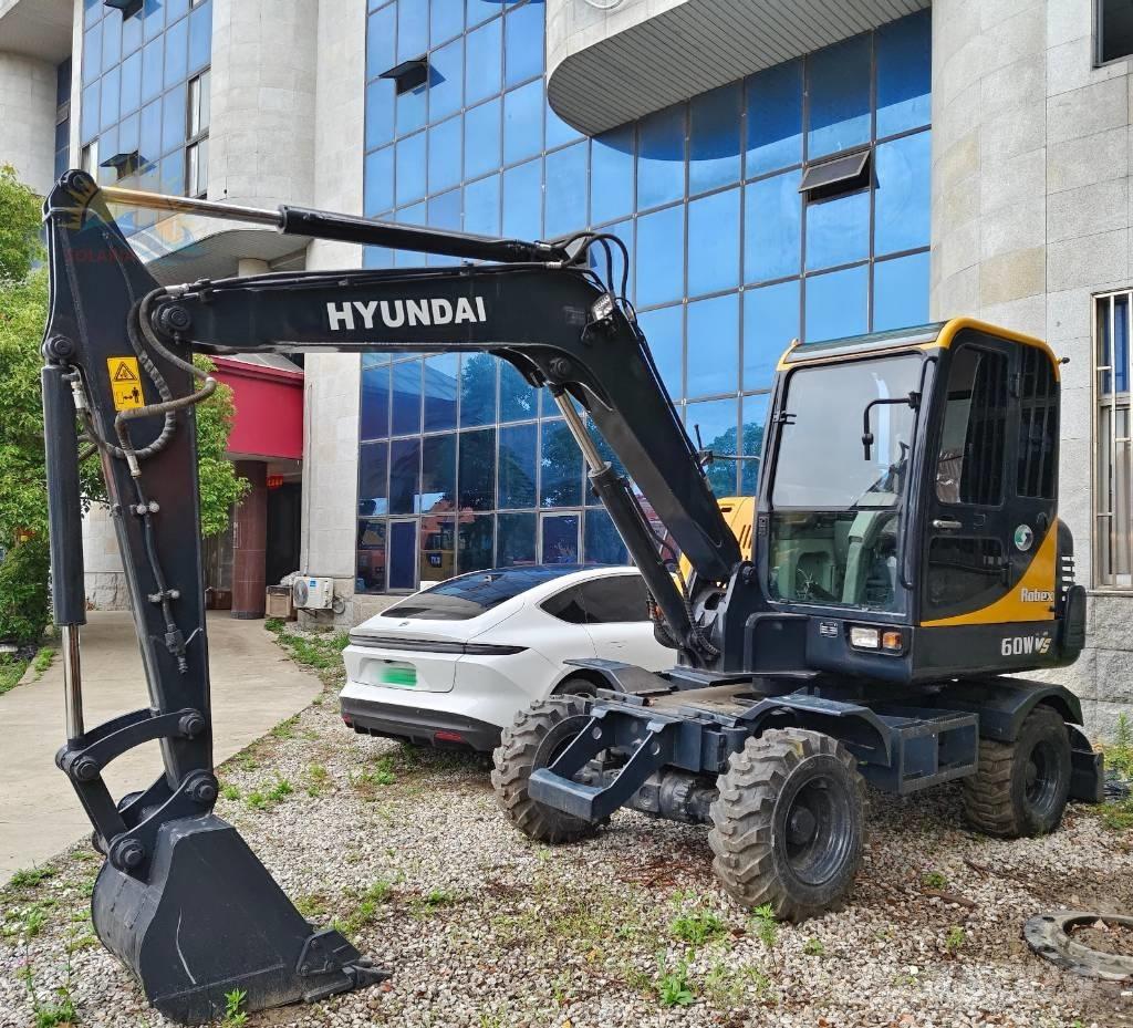 Hyundai 60 W VS Mini excavators < 7t (Mini diggers)