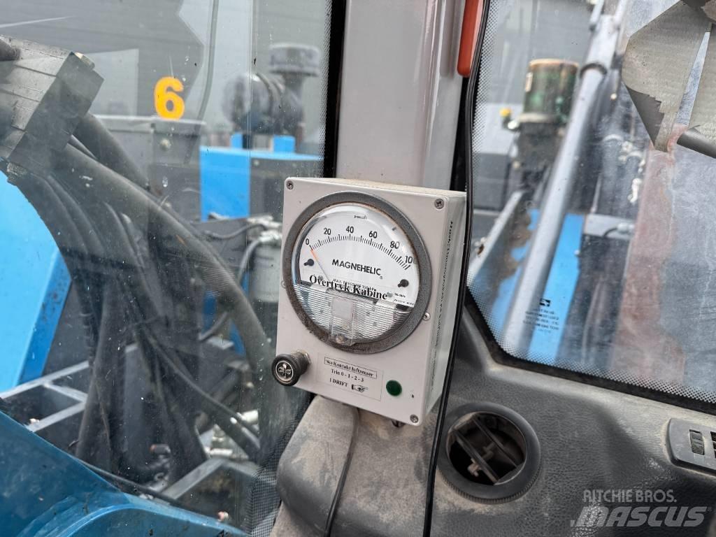 Fuchs MHL 320 Waste / industry handlers