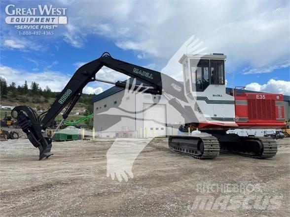 Madill 3800C Knuckle boom loaders