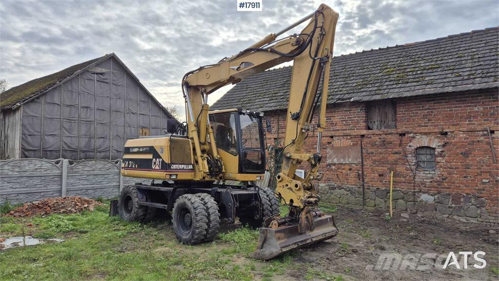 CAT M312 Wheeled excavators