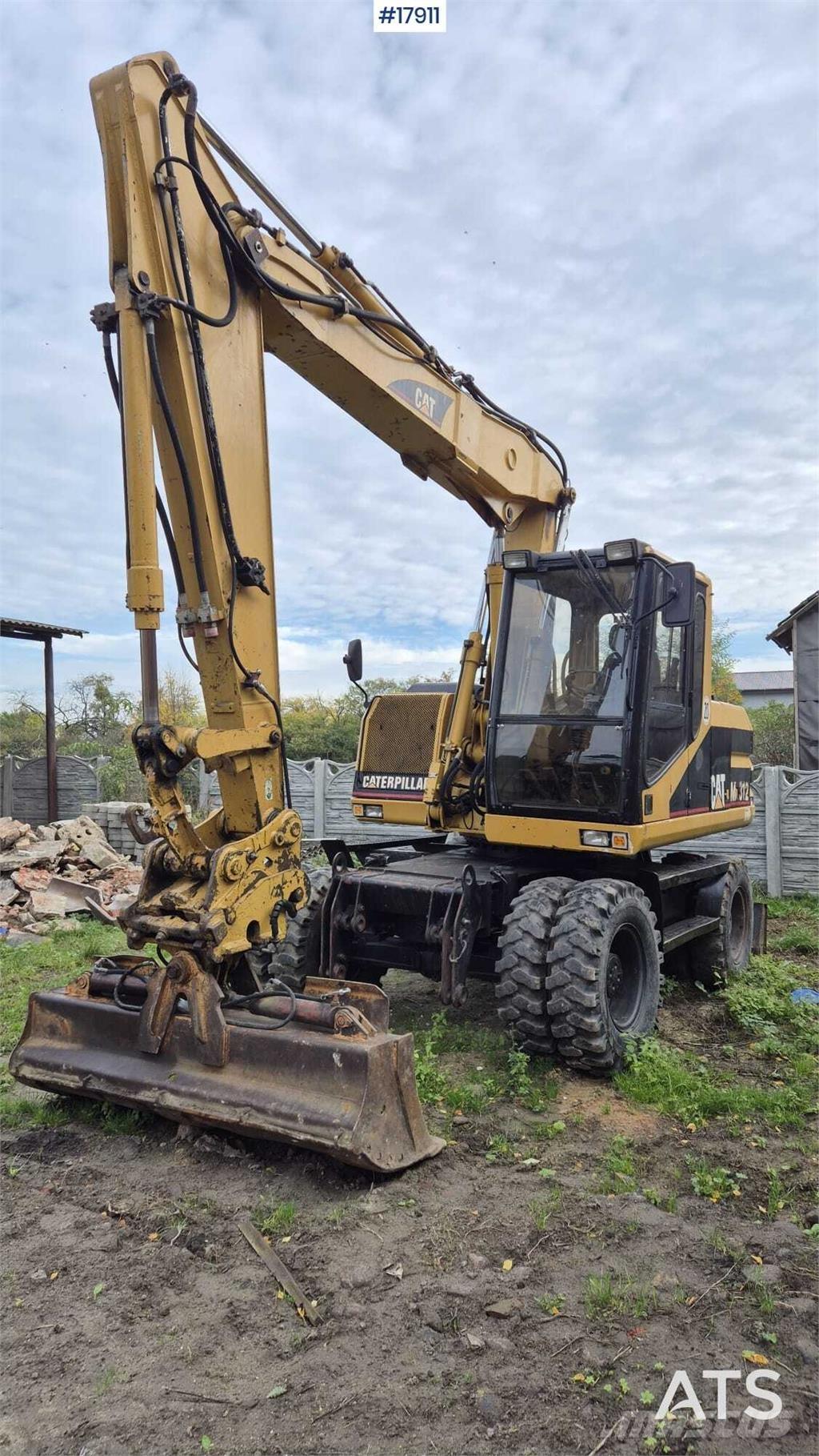 CAT M312 Wheeled excavators