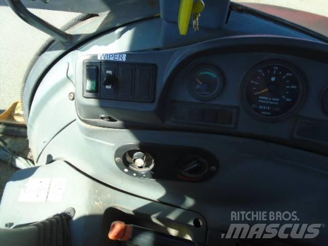 New Holland 575 E Backhoe