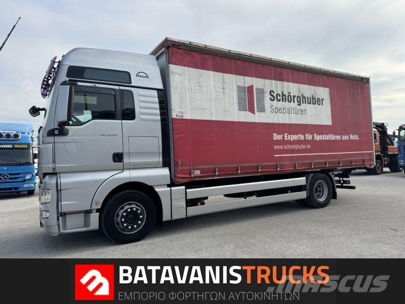 MAN TGX 18.360 ADR Curtain sider trucks