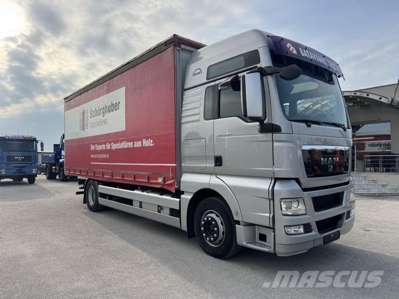 MAN TGX 18.360 ADR Curtain sider trucks