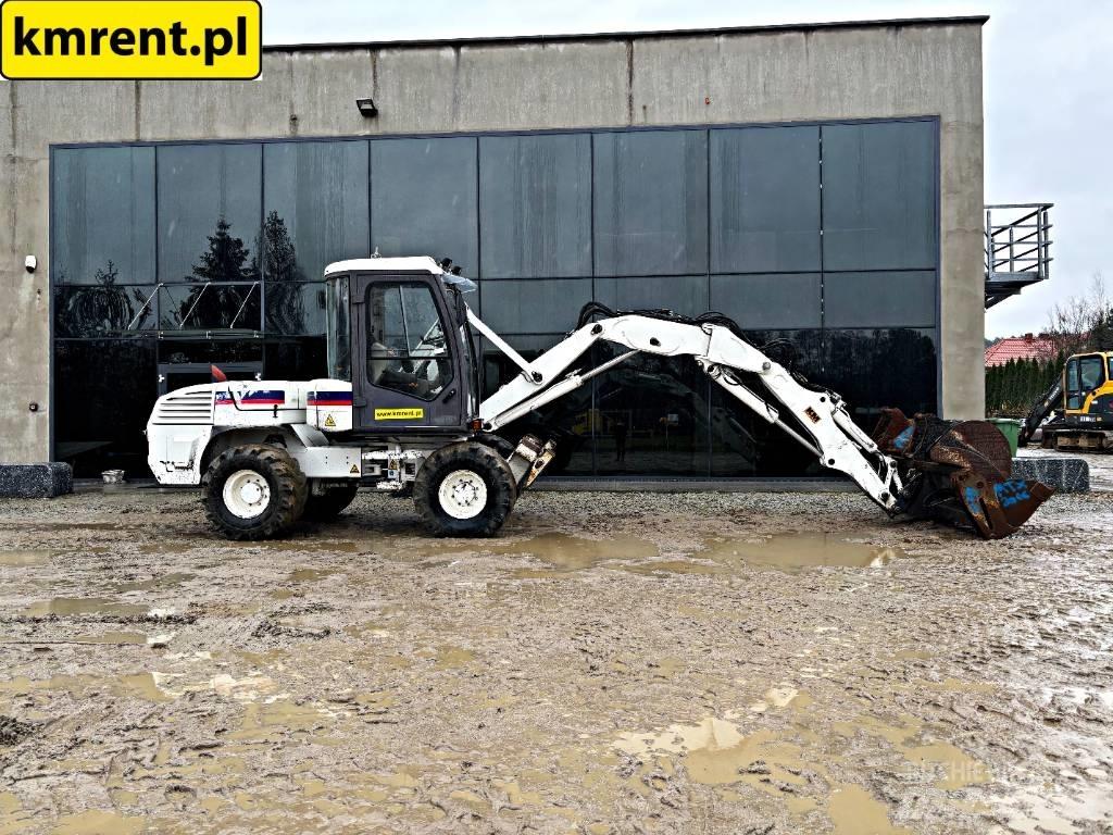 Mecalac 12 M TX Backhoe