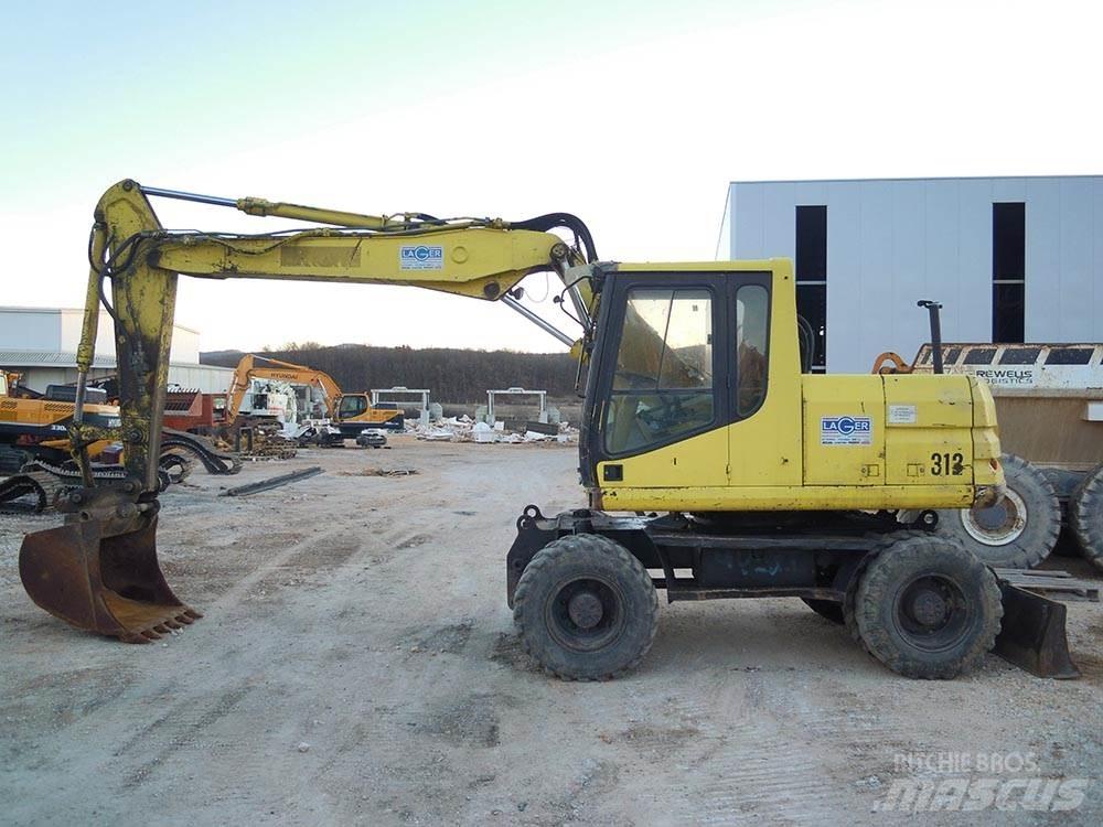 CAT M312 Wheeled excavators
