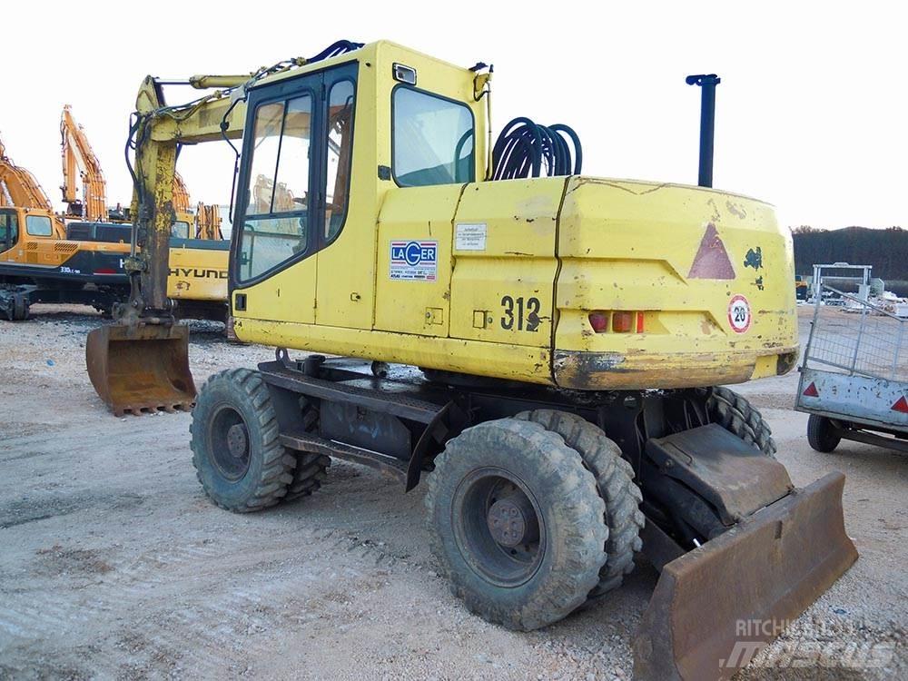 CAT M312 Wheeled excavators