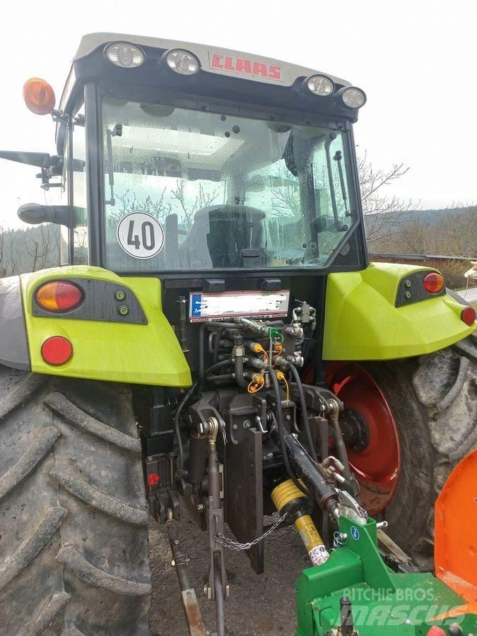 CLAAS Axos 330 CX Tractors