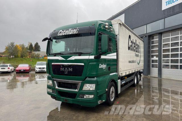 MAN TGX 26.480 6x2 Curtain sider trucks