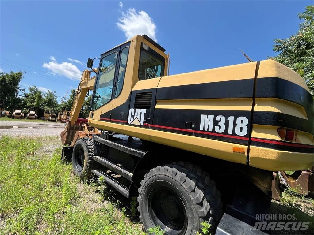 CAT M318 Wheeled excavators